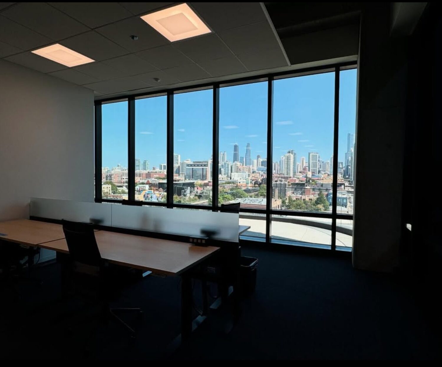 Low-E window film on office windows overlooking the Chicago skyline.