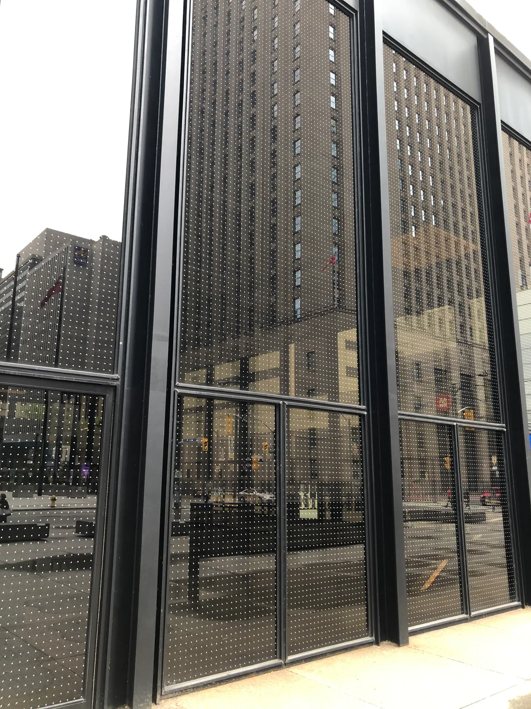 Commercial building with bird strike window film