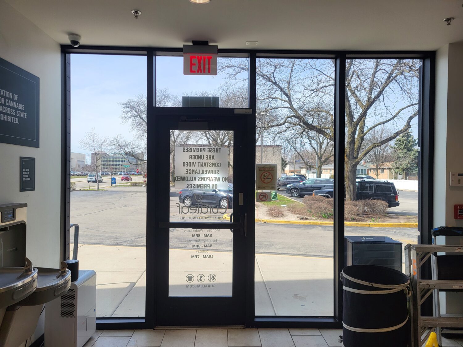 View of storefront from inside that has security window film installed.