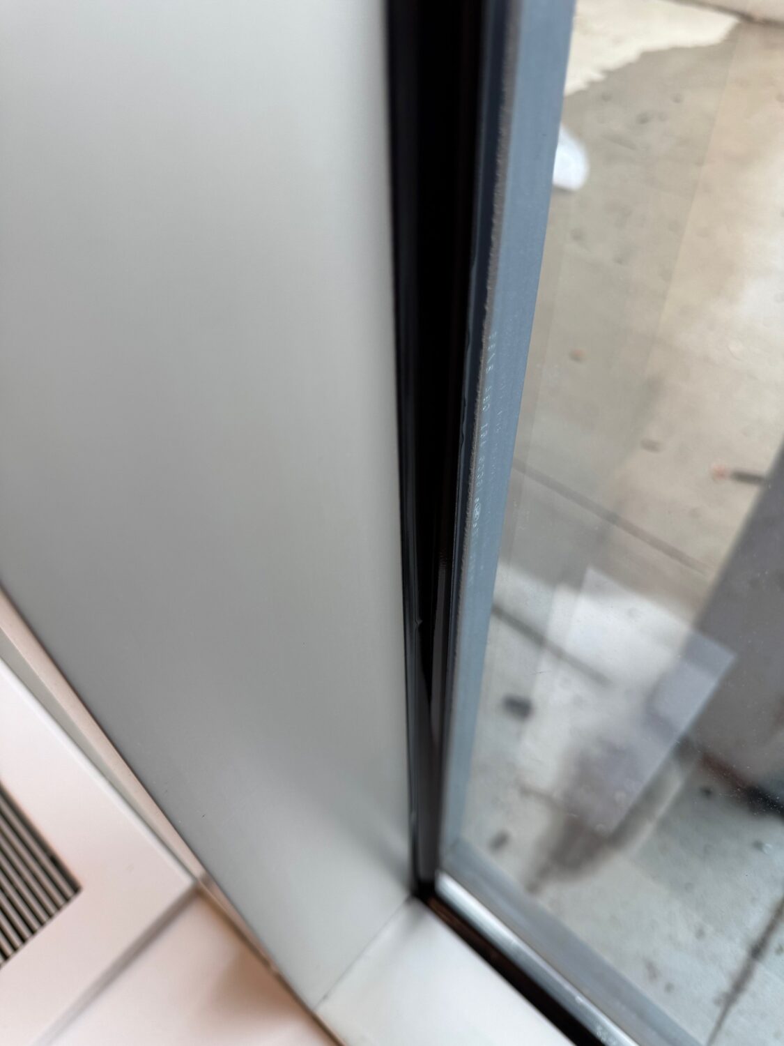 Wet Seal Anchor with Dow 995 Structural silicone to anchor window film to frame.