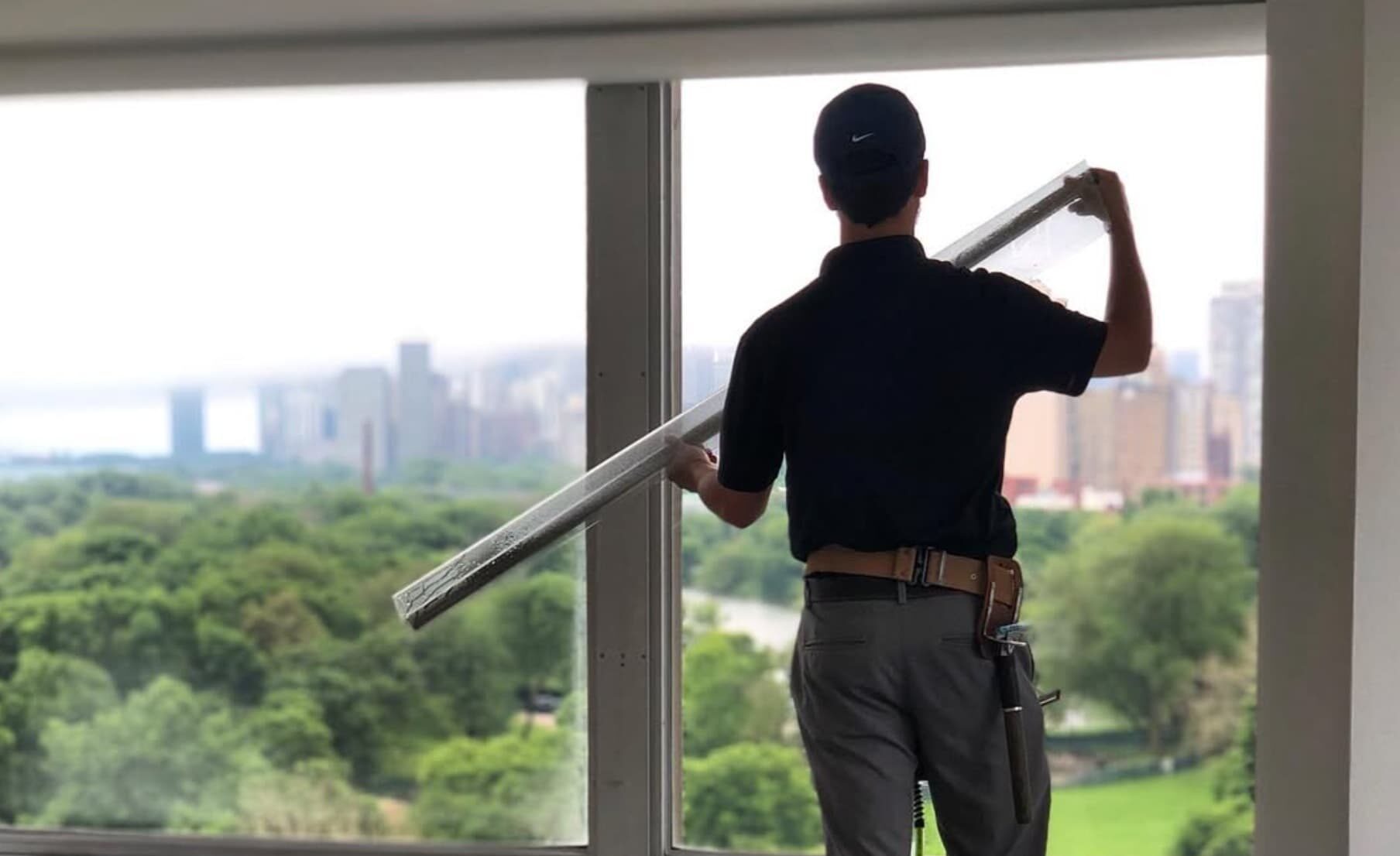 Installing commercial window film on high rise commercial property in Chicago, Illinois