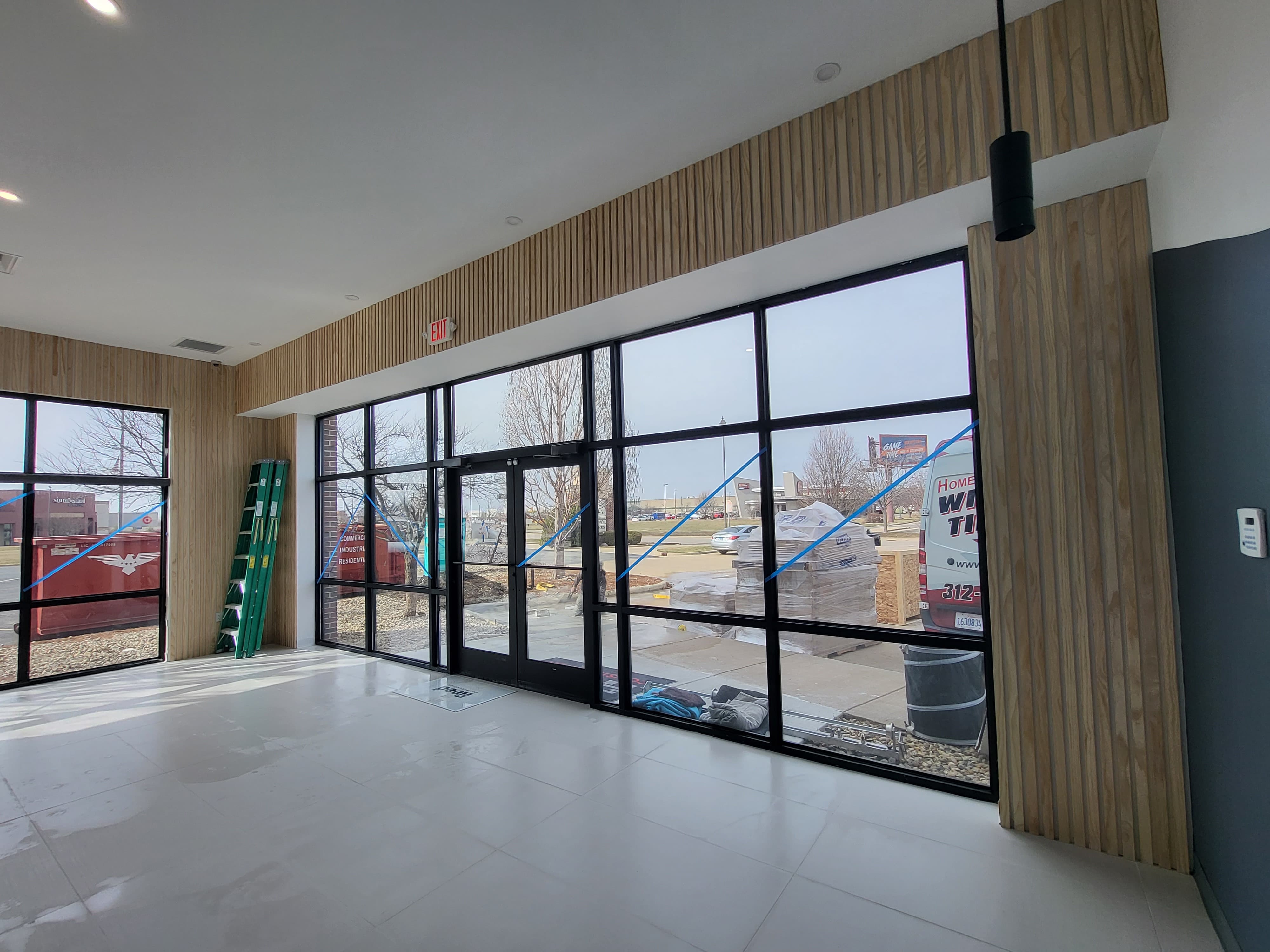 Commercial storefront security film installed on existing glass