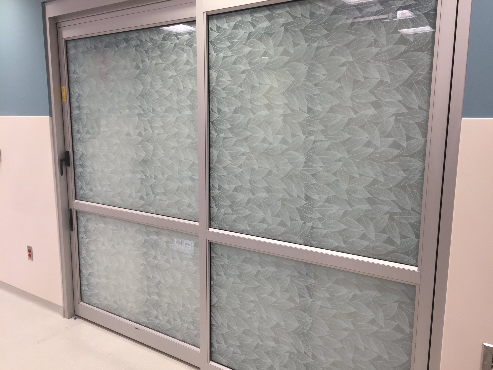 https://aaaglass.com/wp-content/uploads/2026/10/advocate-sherman-hospital-window-film-room-doors.jpg