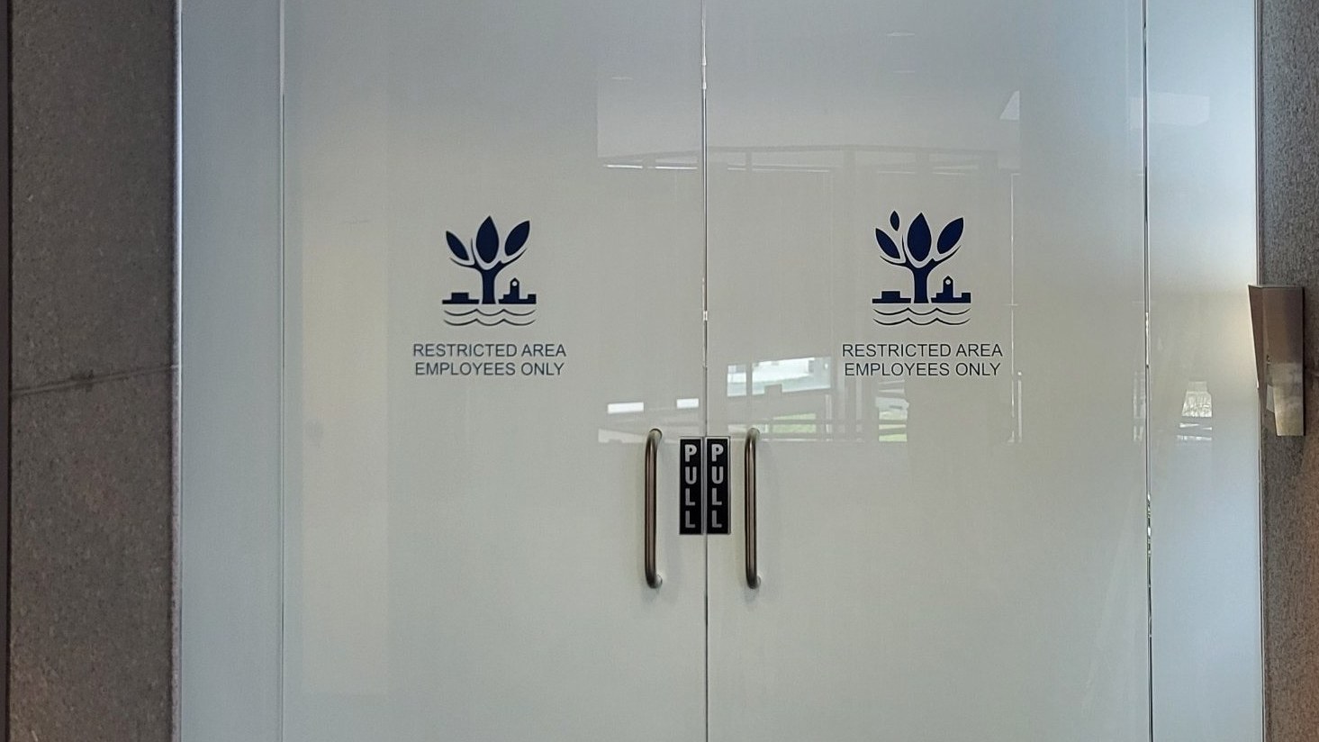 https://aaaglass.com/wp-content/uploads/2026/10/naperville-municipal-center-privacy-film-16x9-1.jpg